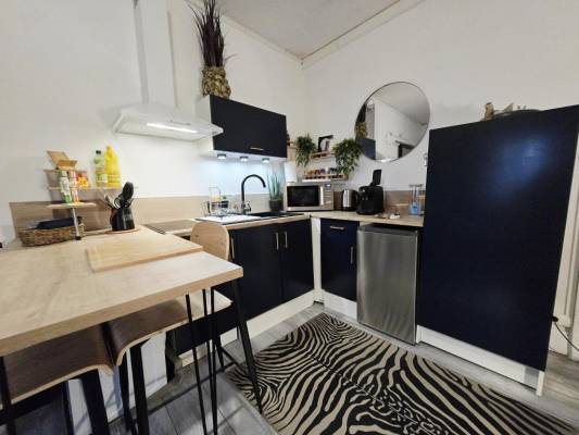 Photo Vittel : studio à l'entrée du parc thermal dans un ancien hôtel au dernier étage